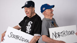 nick and lou with northsider southsider signs